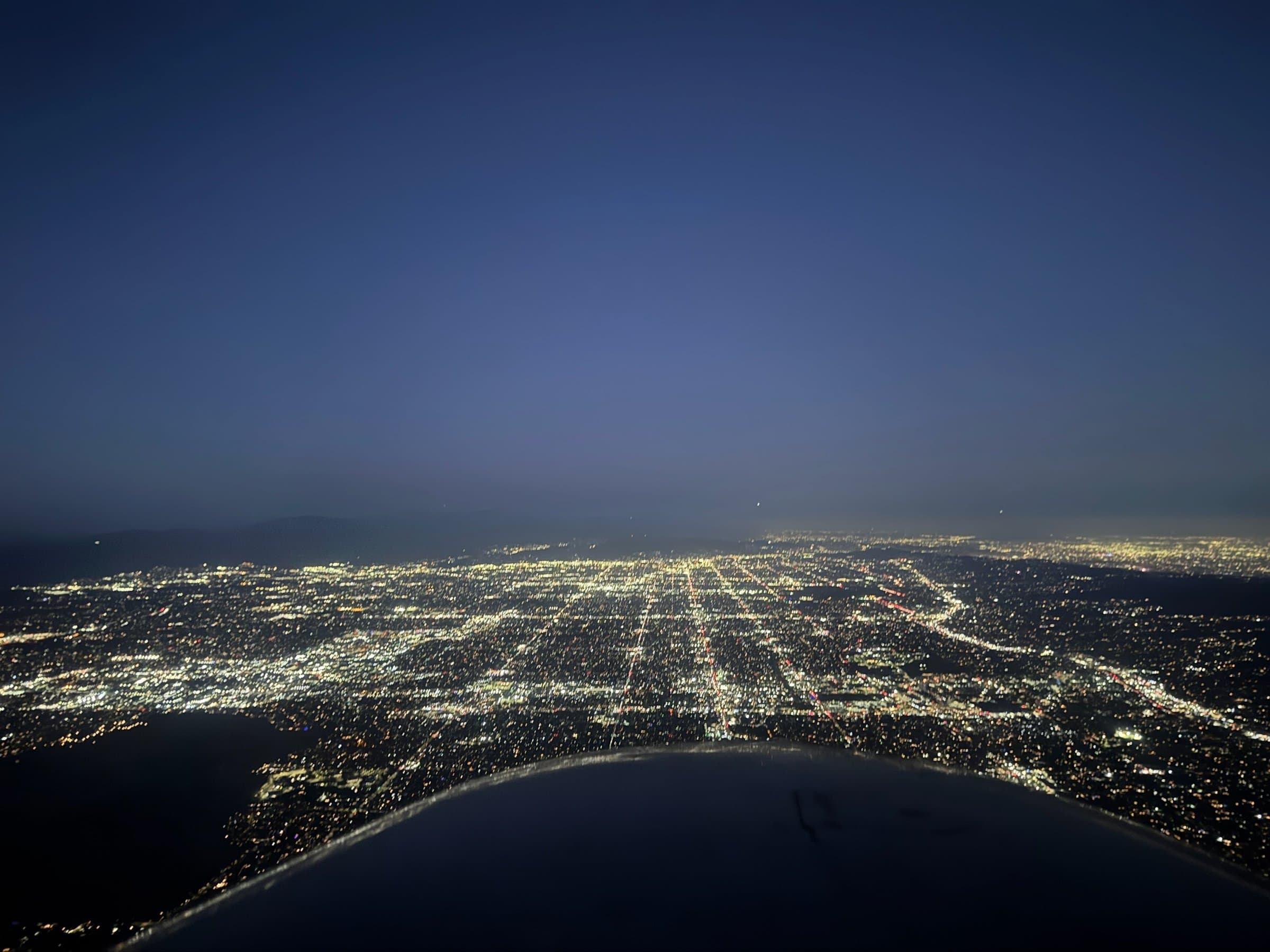 Night view of the Los Angeles basin city lights from the cockpit